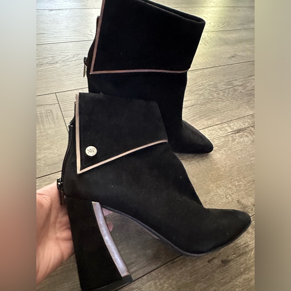 Stuart Weitzman black suede boots size 6 high heals with metallic silver trims.